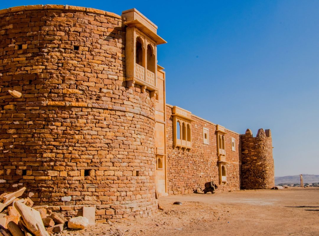 Capture of the ancient Khaba Fort amidst the arid landscapes of Jaisalmer, India.